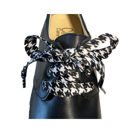 Skosn�re hundtand svart